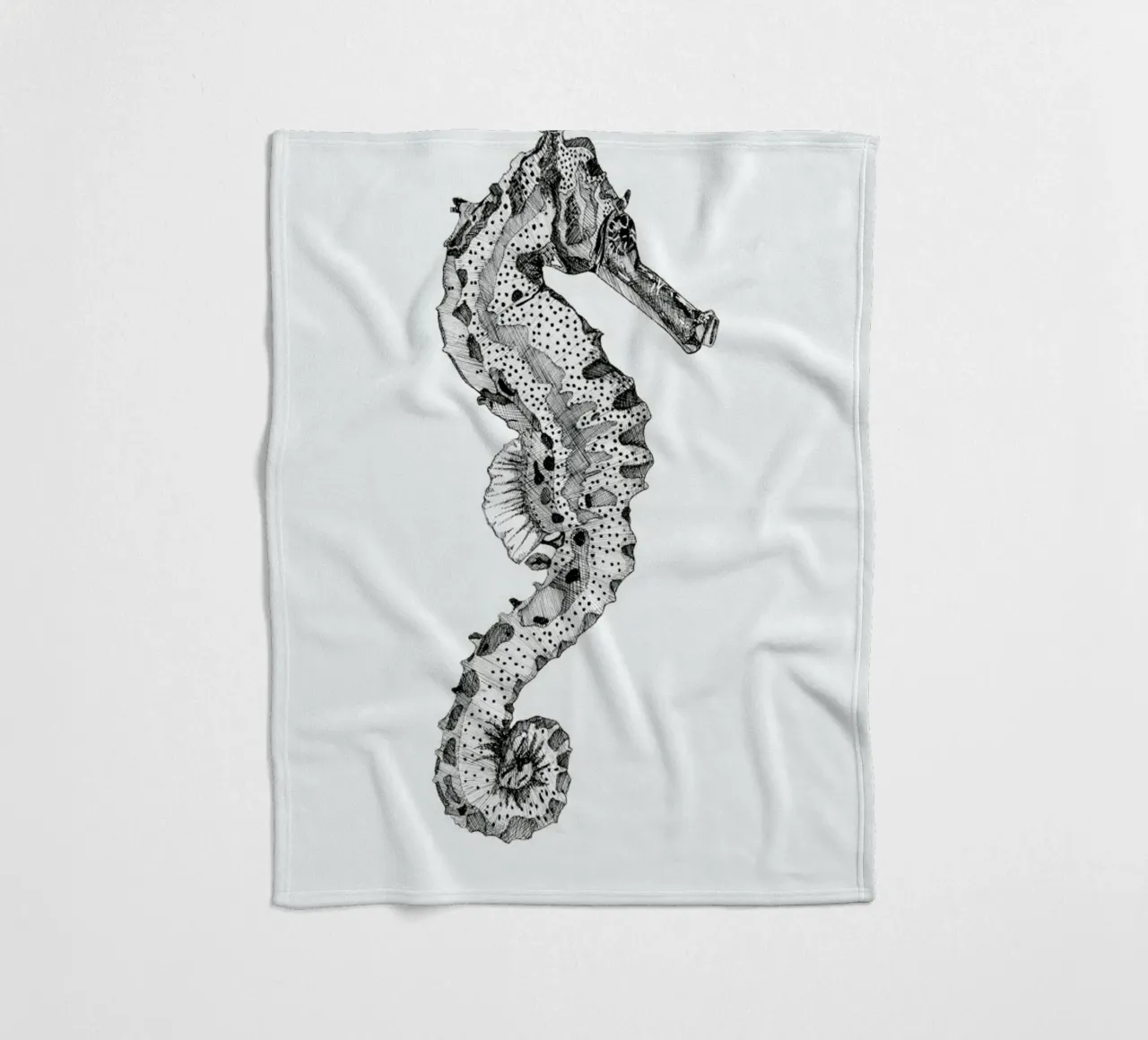 The Seahorse fleece blanket by Mathilde Olsen