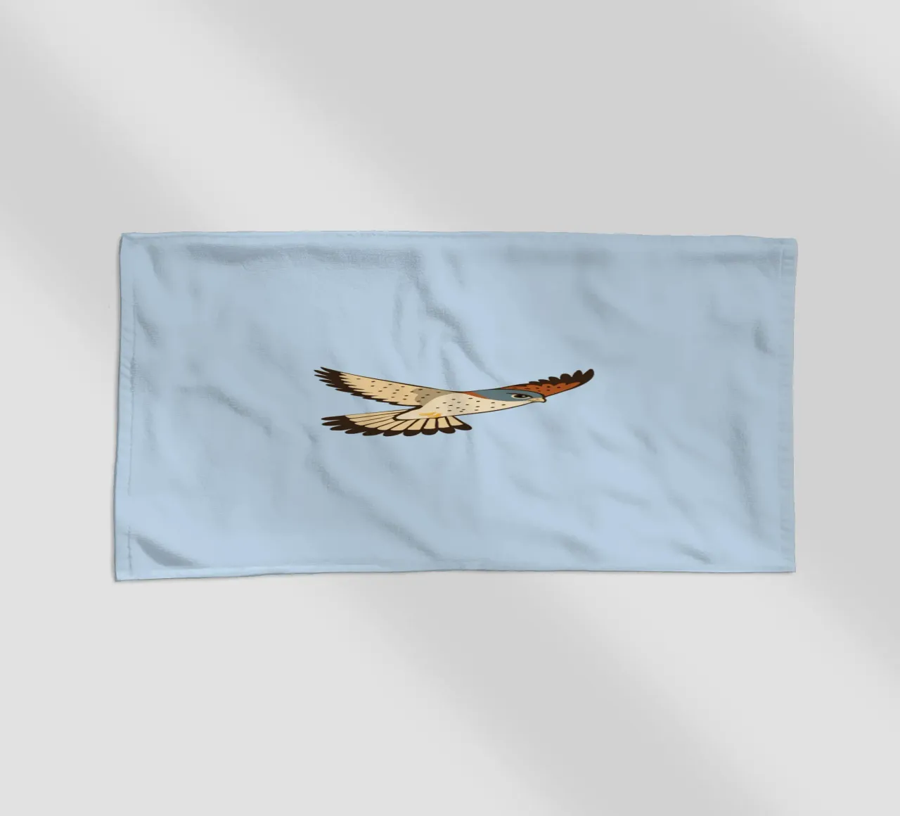 Un gheppio in volo telo mare da Bwiser