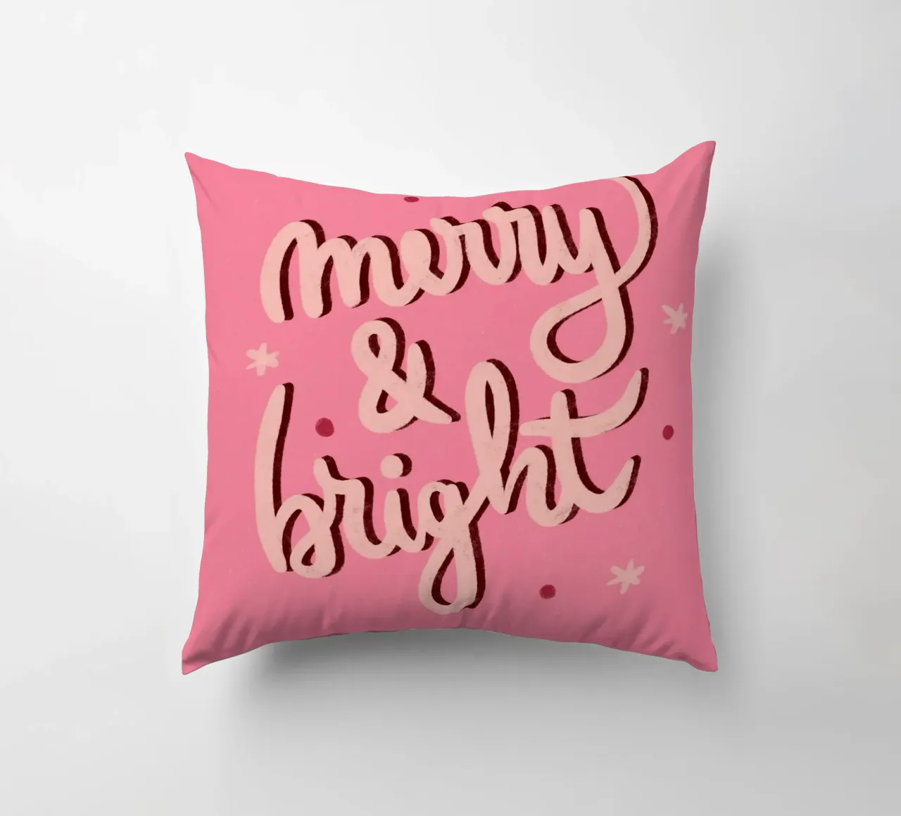 Allegro e luminoso cuscino da Wackapacka Holiday Shop