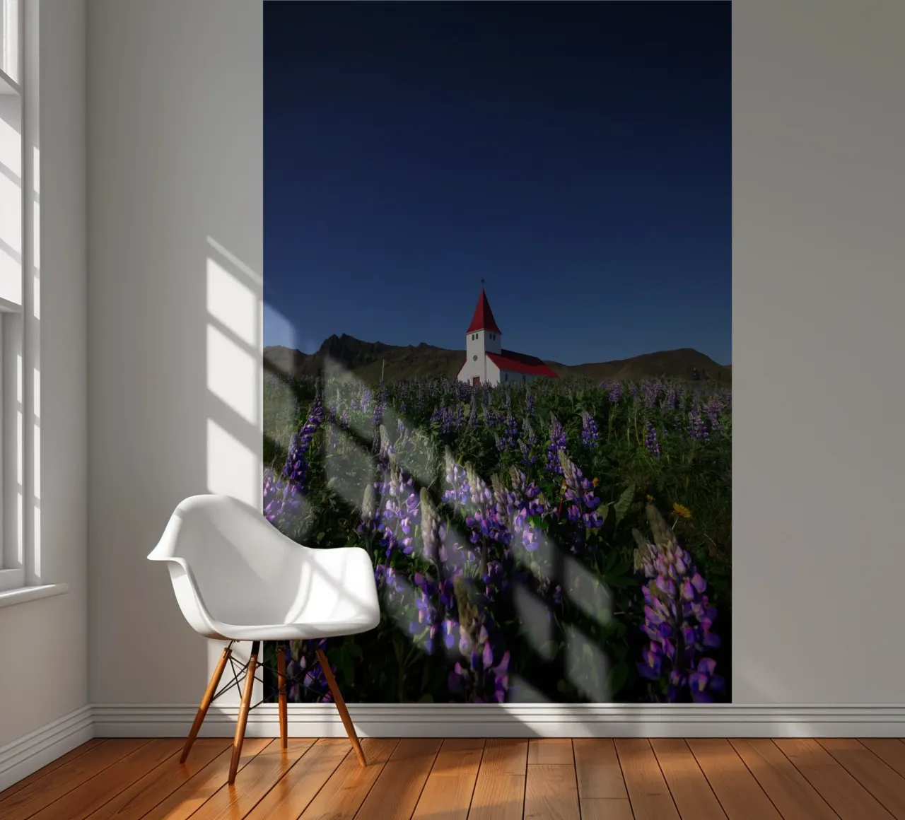 Church and lupins in Vik Fototapete von Fjöllart