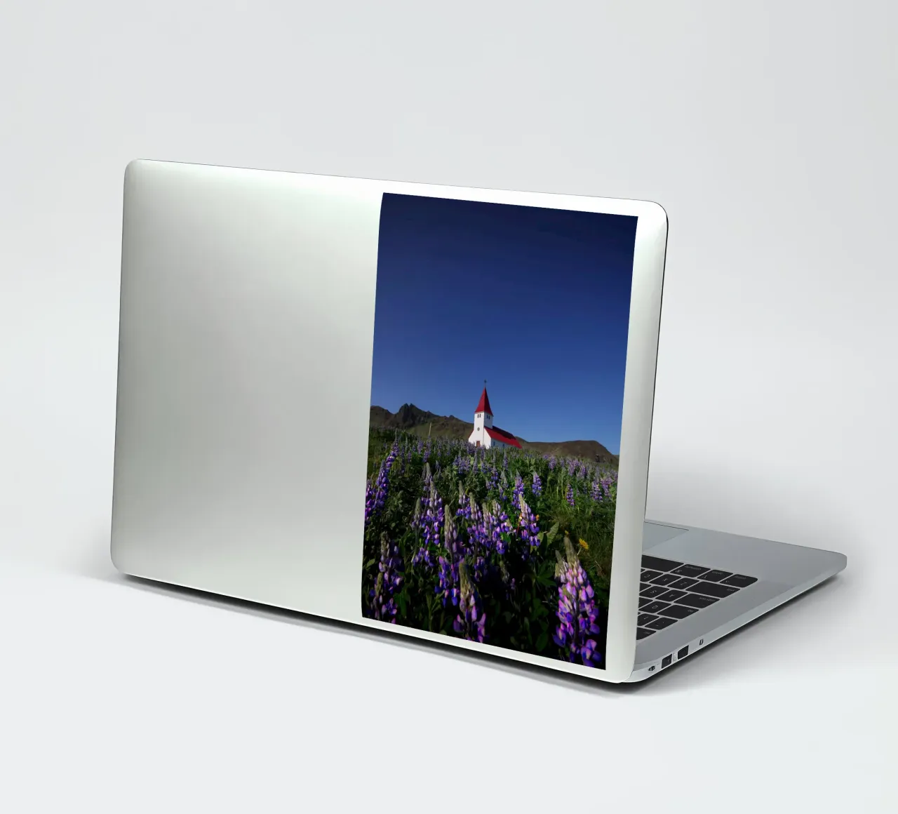 Church and lupins in Vik sticker by Fjöllart