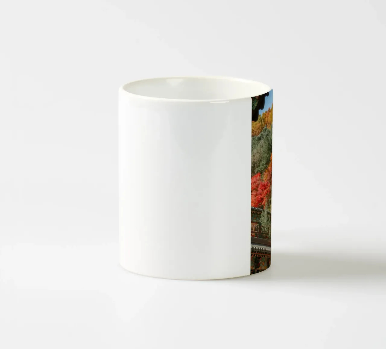 I tetti dei templi coreani in autunno tazza in ceramica da mbgraphx2