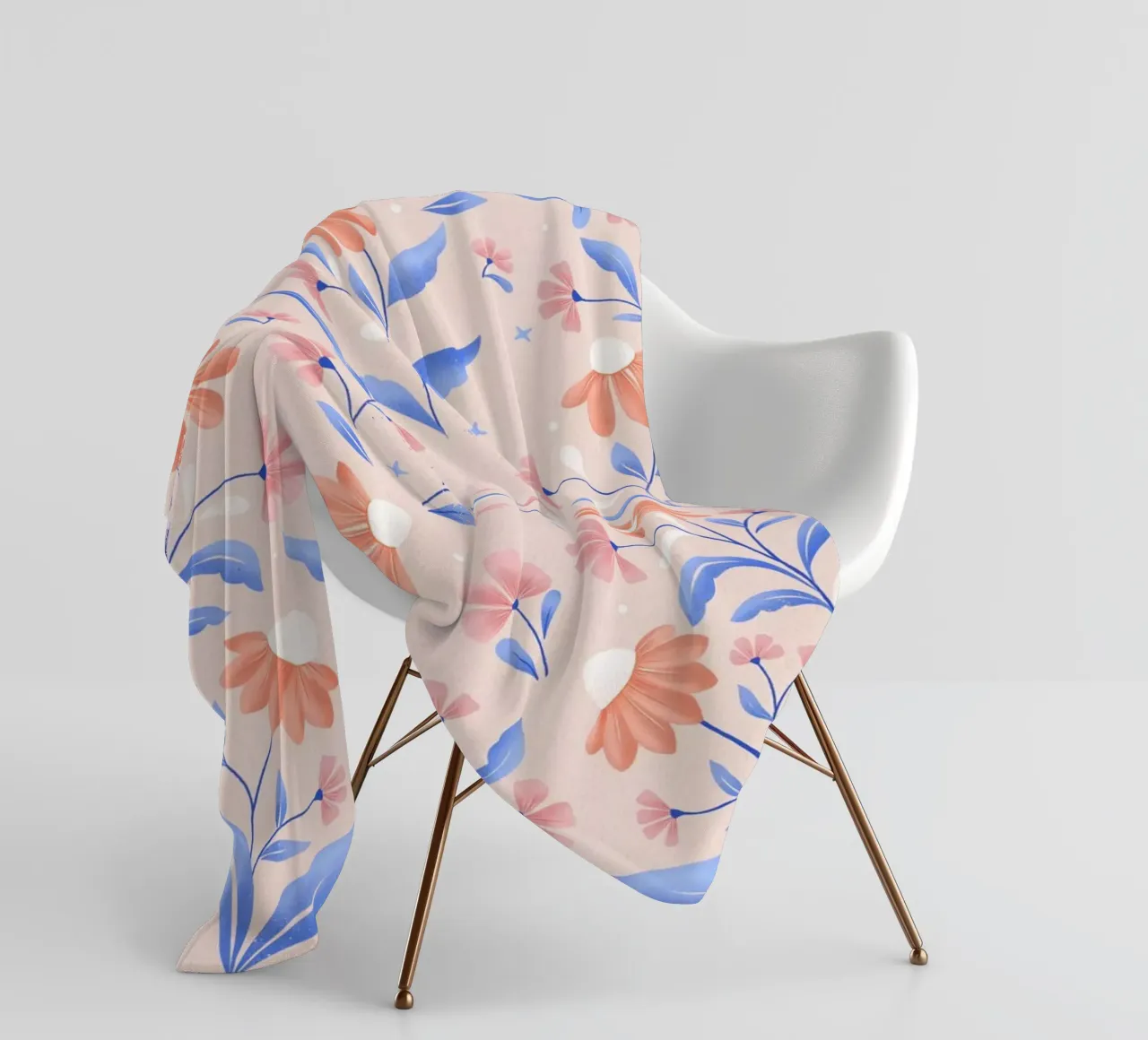 Spring floral pattern in peach colour with contrasting blue fleece blanket by CalliLetters