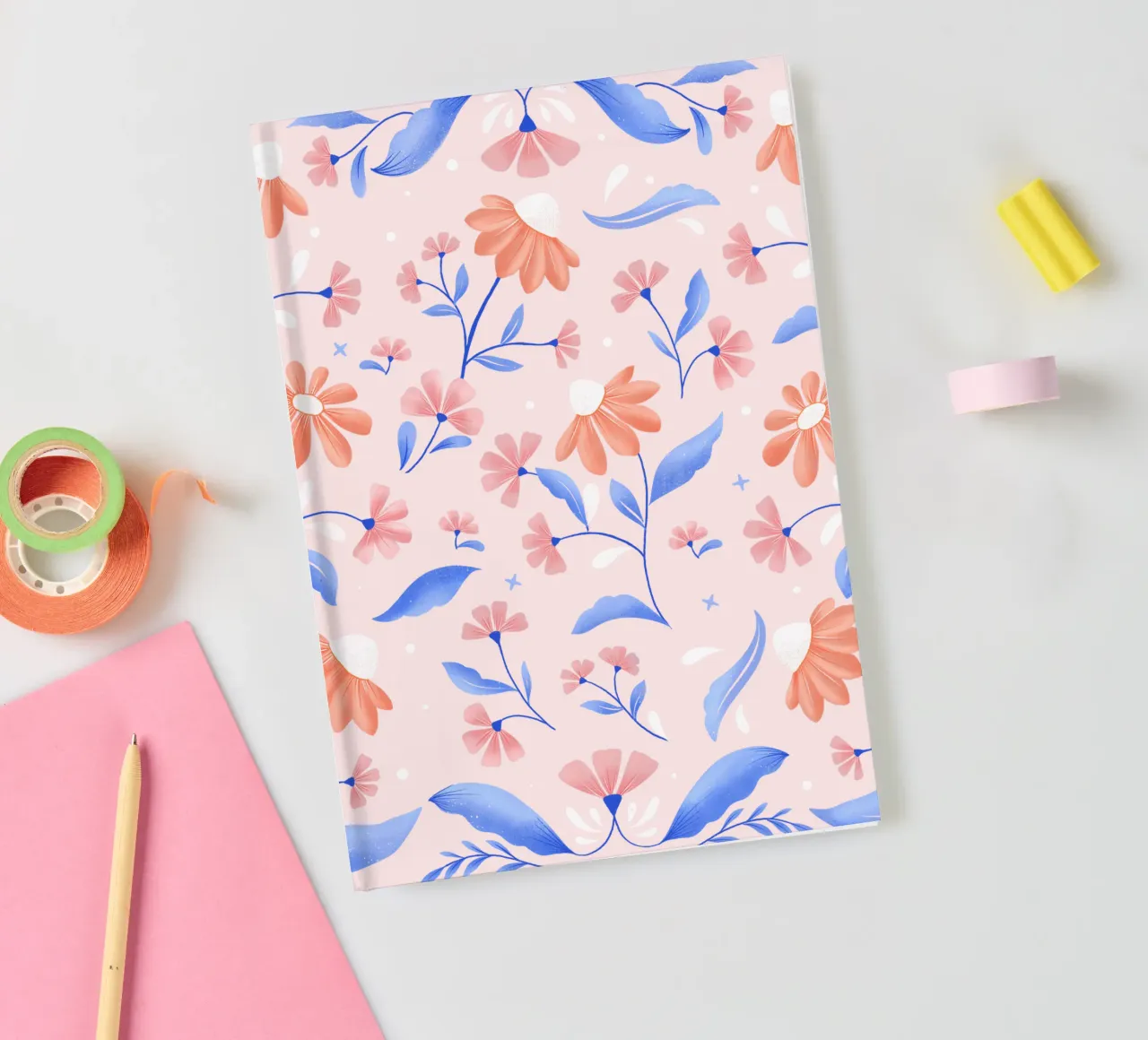 Spring floral pattern in peach colour with contrasting blue notebook by CalliLetters