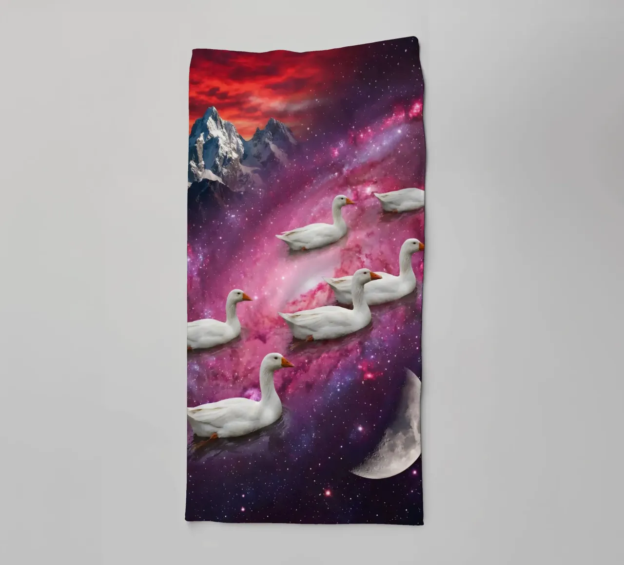 Cosmic Ducks Floating Through a Vibrant Galaxy Scene towel by Cosmic Reverie Studio