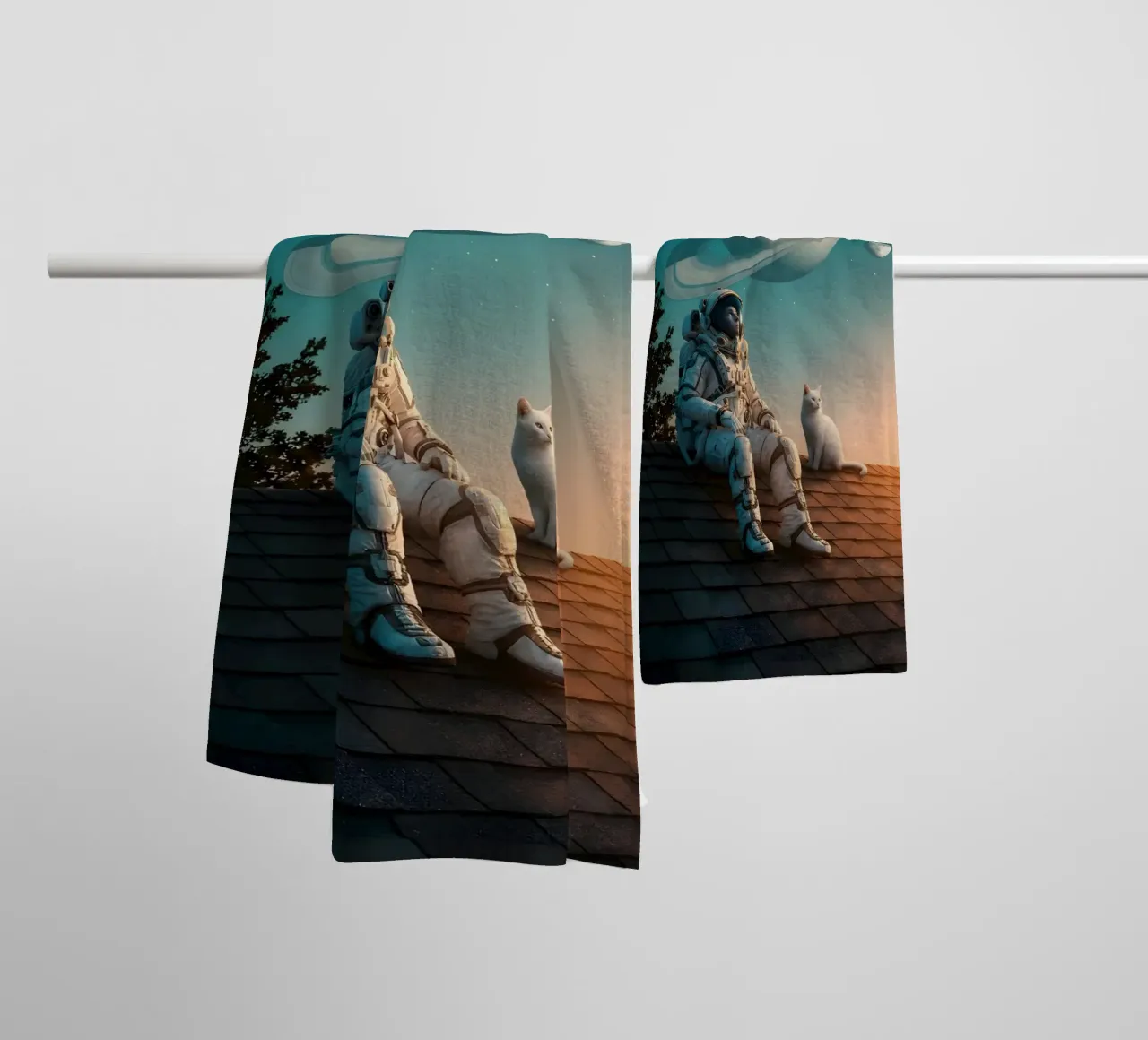 Cosmic Dreamer: Astronaut and Cat Under Saturn Sky towel by Cosmic Reverie Studio