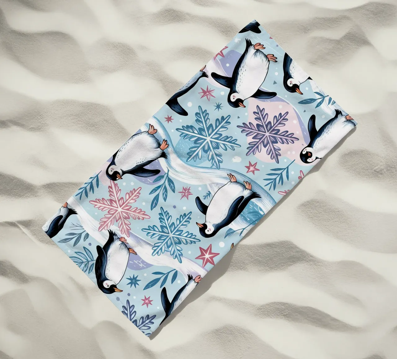 Simpatici pinguini e fiocchi di neve in un ambiente invernale telo mare da kidz&family