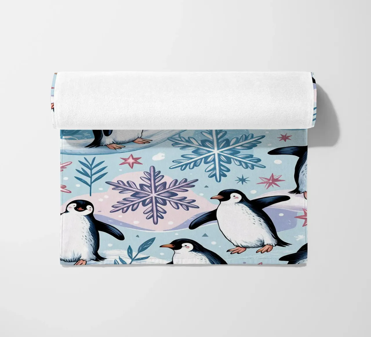 Simpatici pinguini e fiocchi di neve in un ambiente invernale telo mare da kidz&family