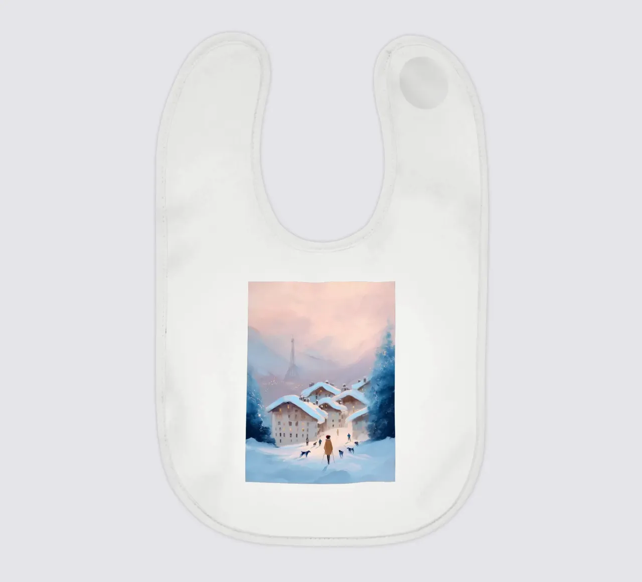 Tramonto invernale su villaggio innevato con sciatori e vista Eiffel bavaglino da Holiday Hearth Prints