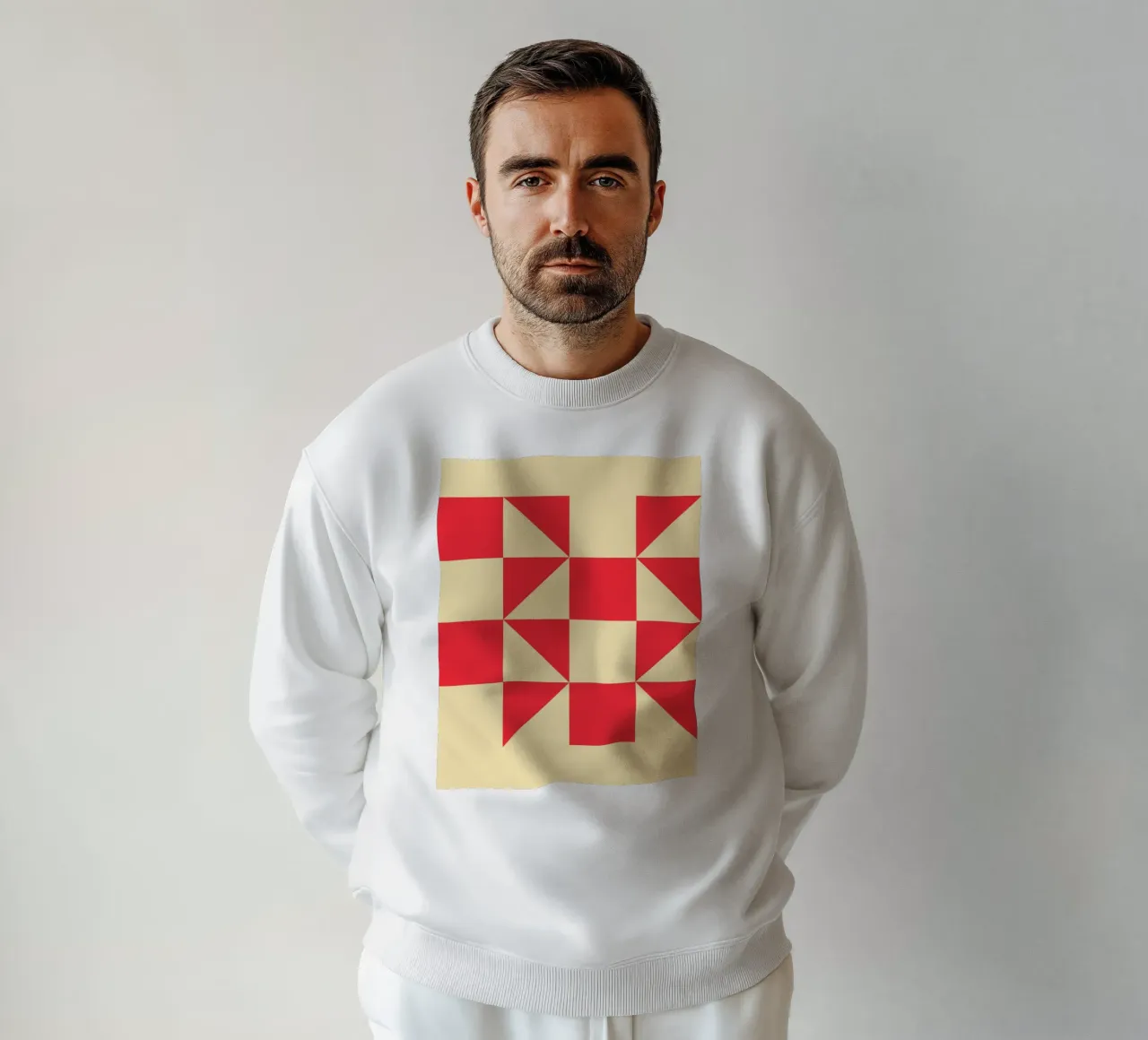 Abstract Bauhaus triangular pattern in red and cream sweatshirt by Casa Vibes