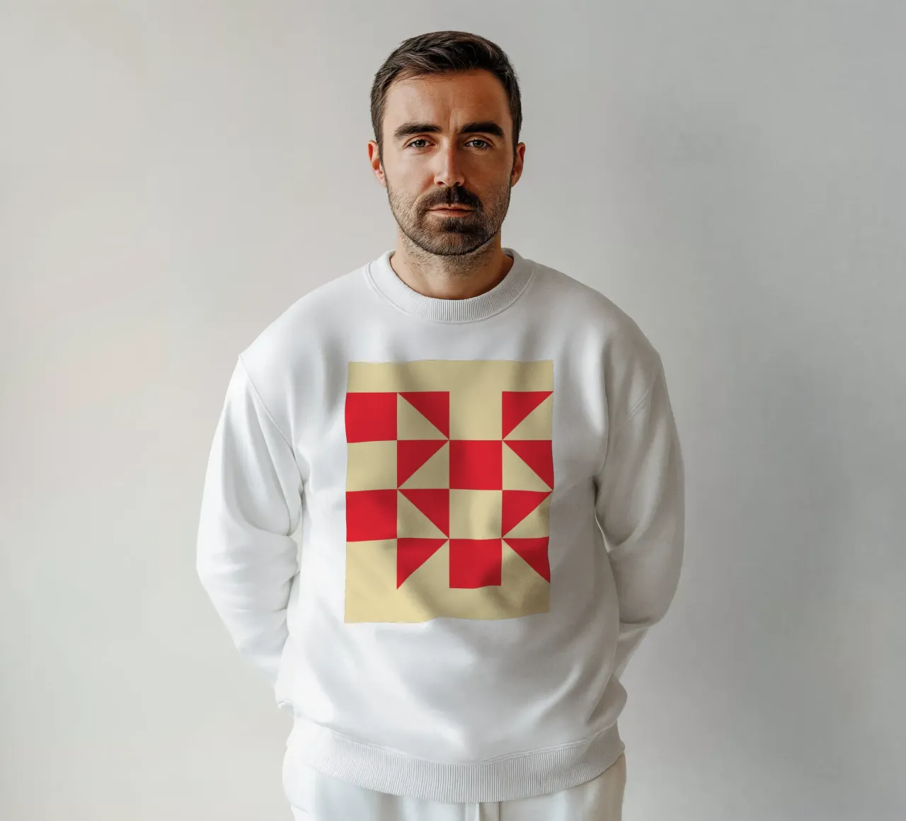 Abstract Bauhaus triangular pattern in red and cream sweatshirt by Casa Vibes