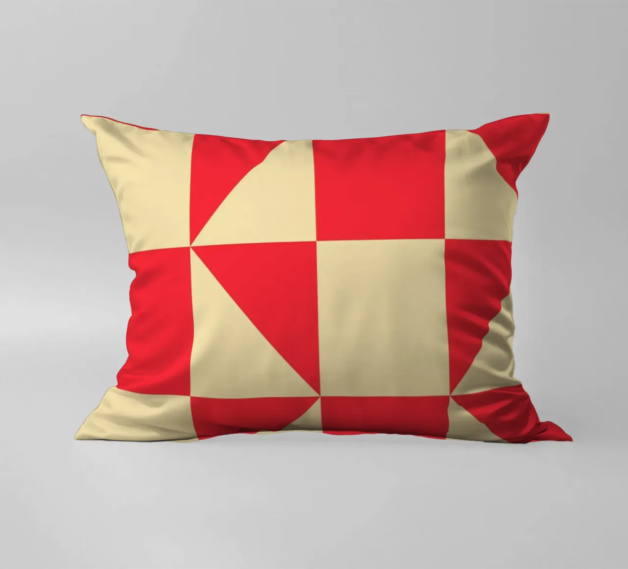 Abstract Bauhaus triangular pattern in red and cream decorative cushion by Casa Vibes