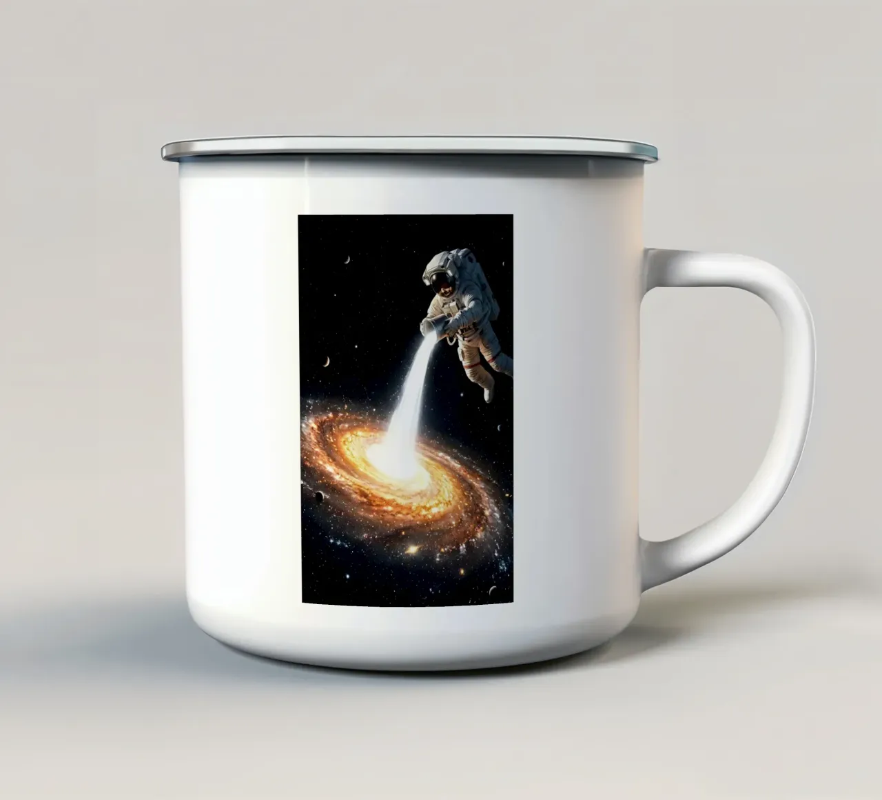 Un astronauta che diffonde luce in una galassia cosmica tazza in smalto da Cosmic Reverie Creations