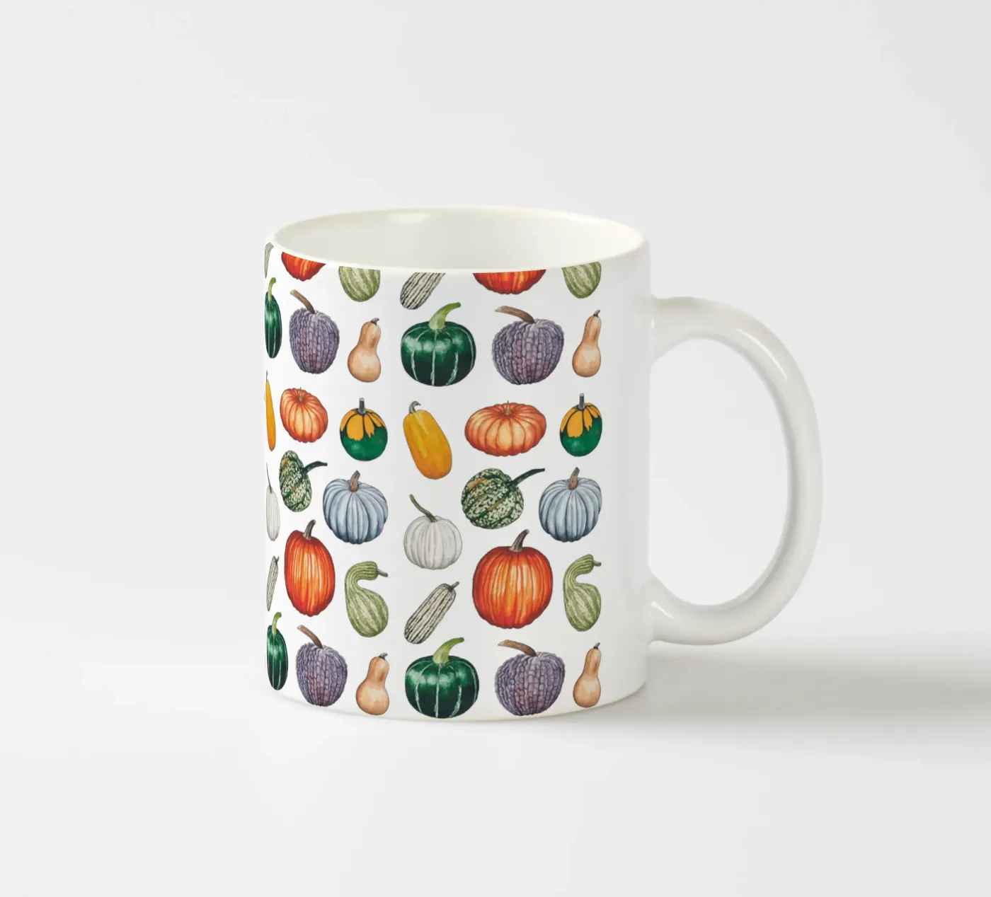 Pumpkin pattern ceramic mug by Artsymalistic