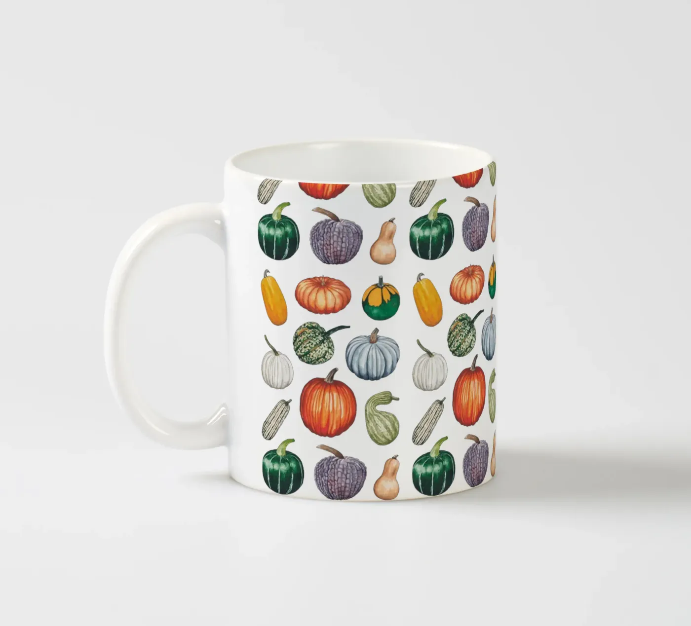 Pumpkin pattern ceramic mug by Artsymalistic