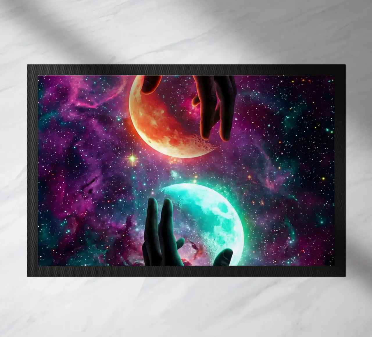 Mani che sorreggono due lune gemelle nello spazio cosmico colorato zerbino da Cosmic Reverie Creations