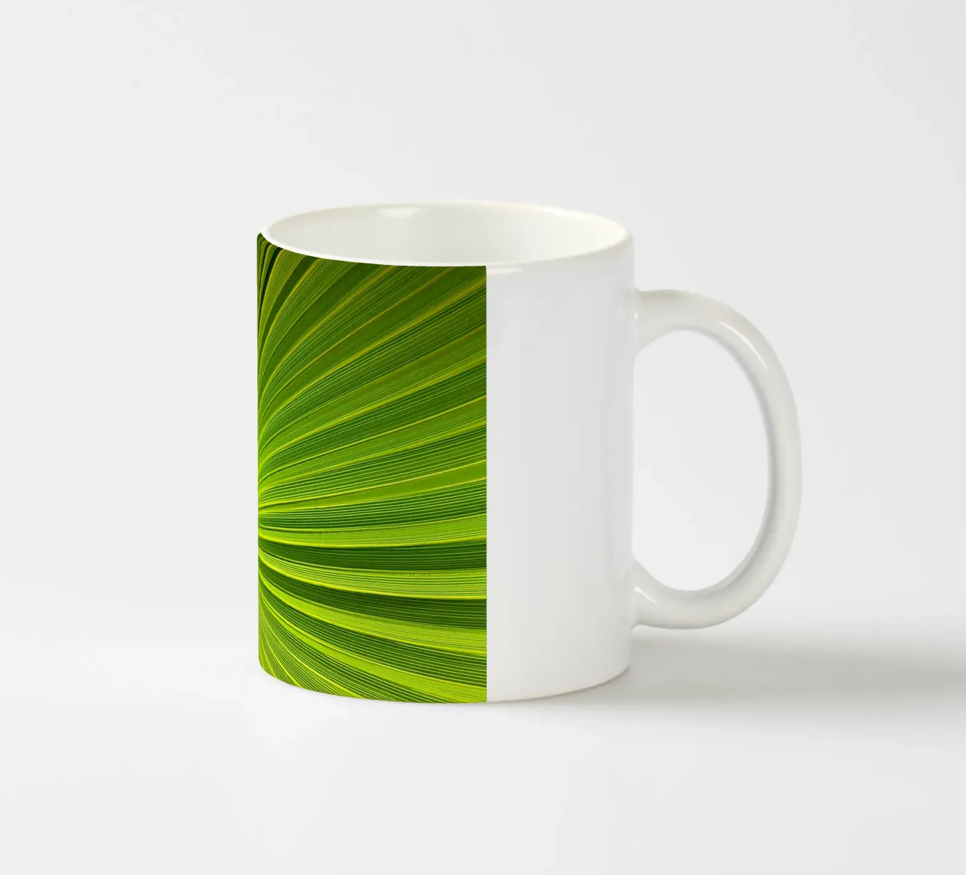 Palm leaf ceramic mug by Atteloi