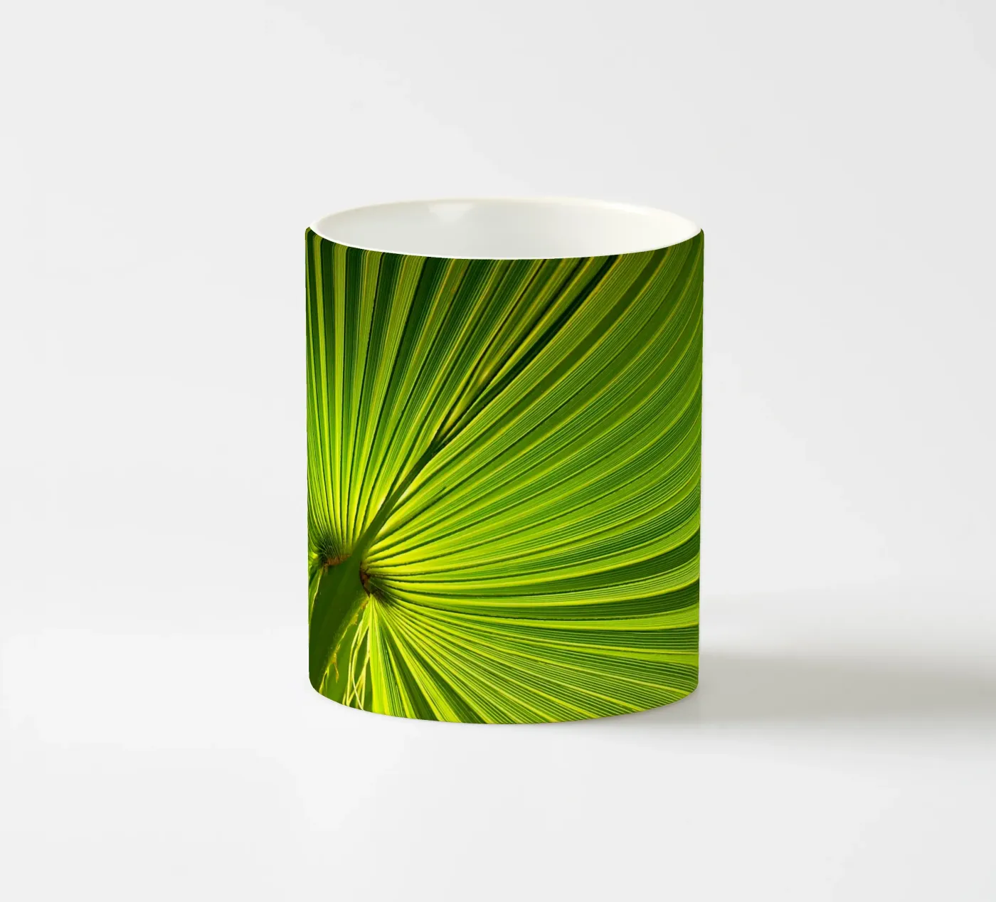 Palm leaf ceramic mug by Atteloi
