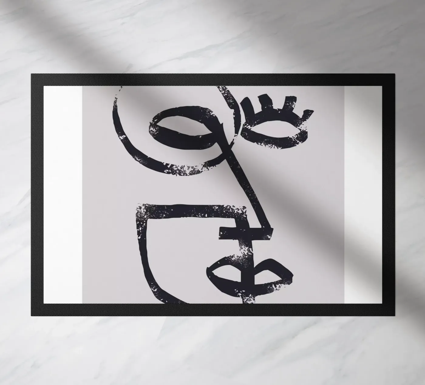 Abstract face doormat by Whole©