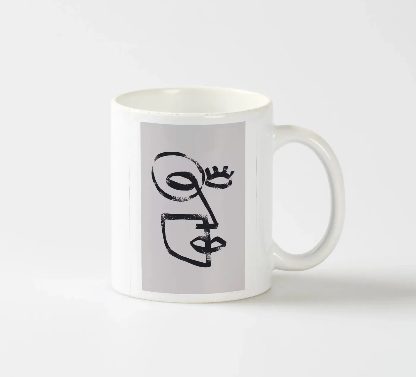 Abstract face ceramic mug by Whole©