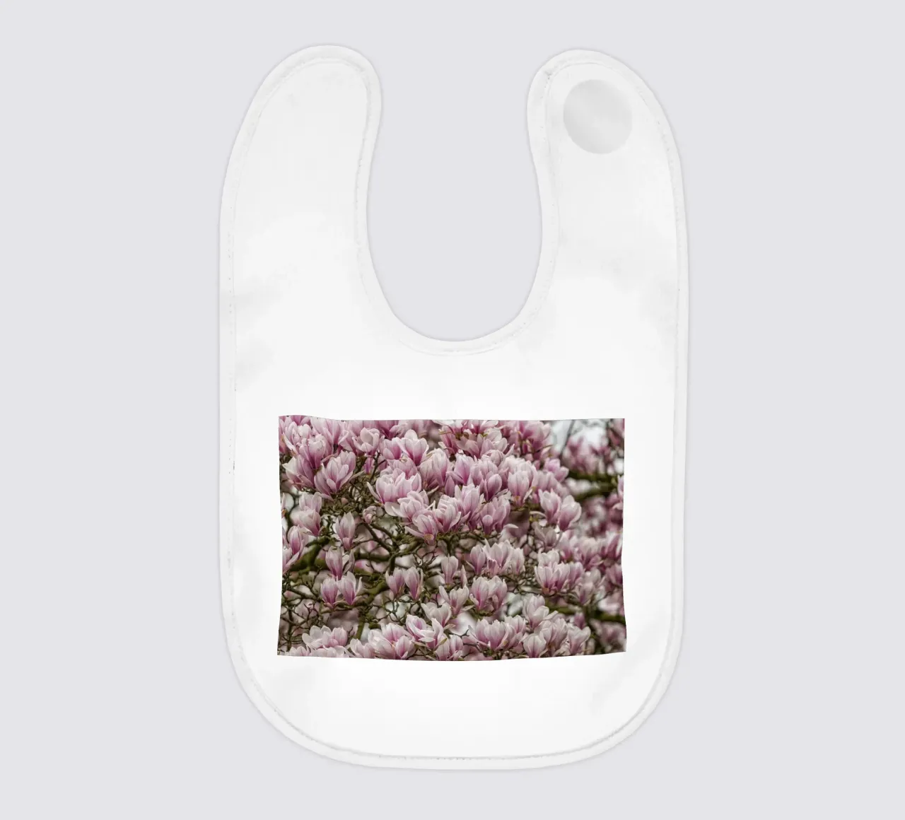 Pink Magnolia's baby bib by Curious Collections by Marielle Leenders