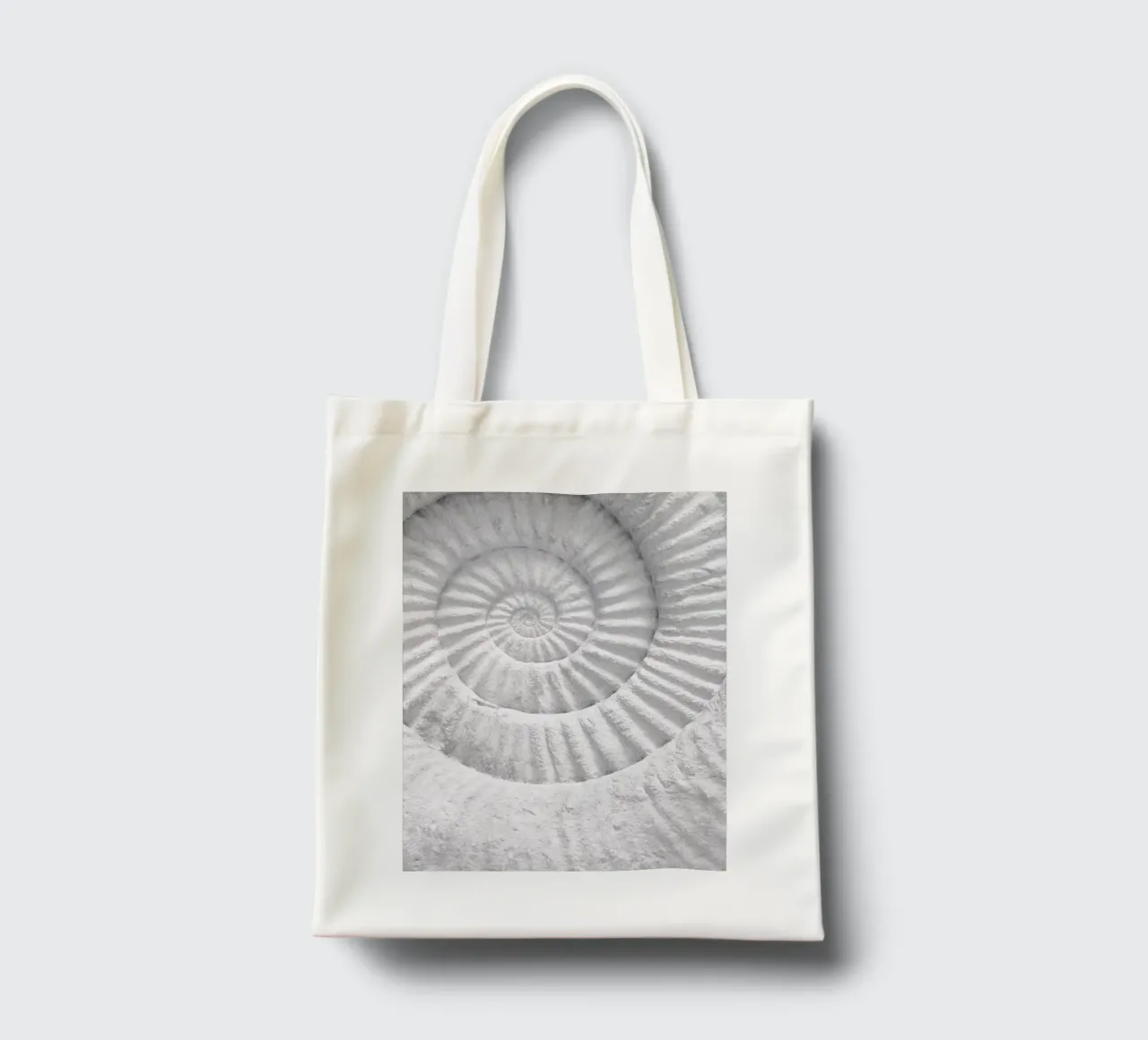 Fossil spiral - Timeless natural art in a minimalist style tote bag by Whole©