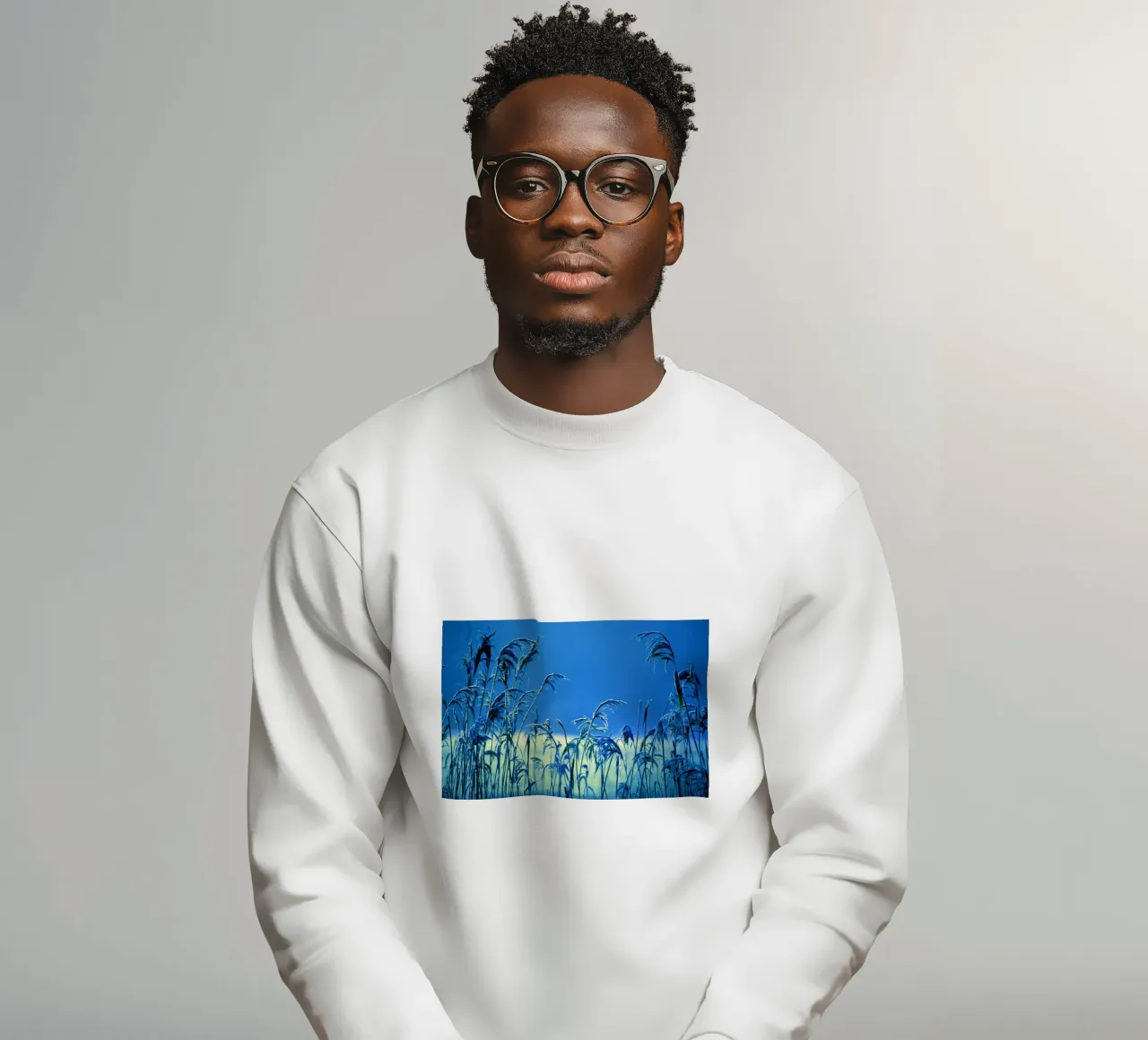 Reeds against a blue background sweatshirt by Something for you