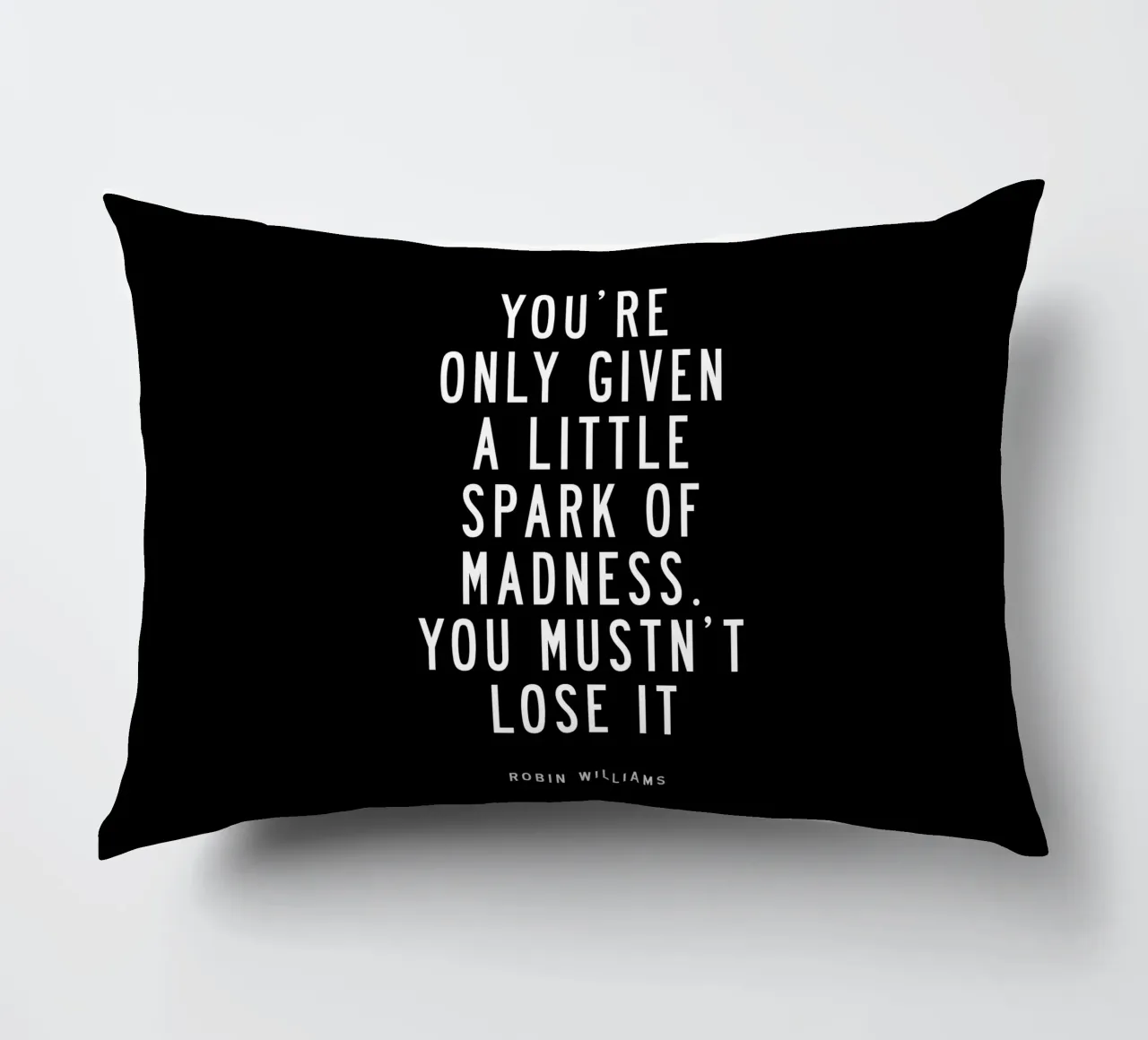 Ti viene data solo una piccola scintilla di follia Typografie cuscino da THE MOTIVATED TYPE