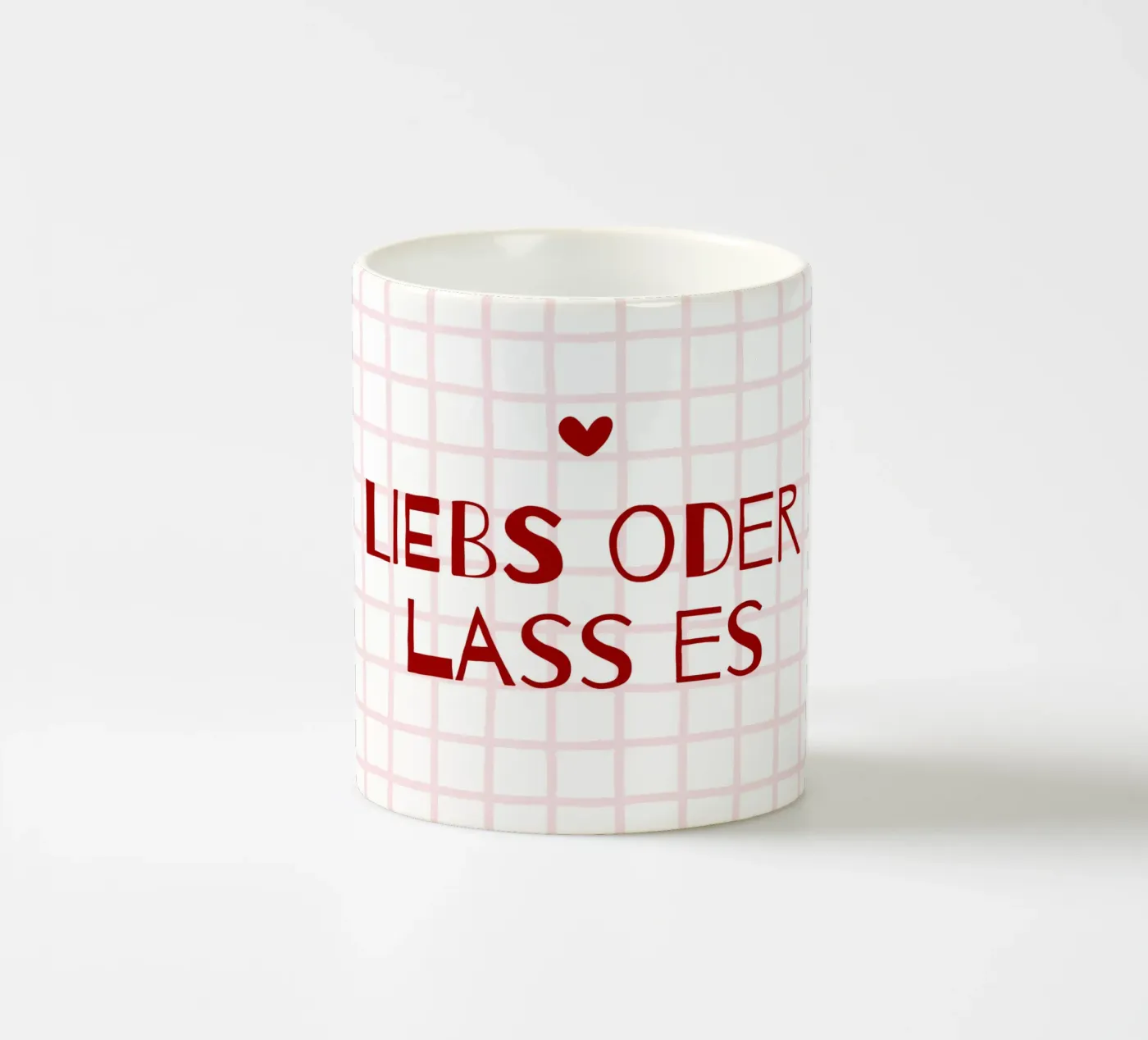 Liebs oder lass es ceramic mug by CSK DESIGN