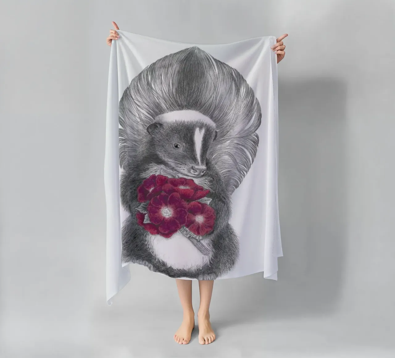 Scruffles Wigglebottom Skunk beach towel by Le Canot Rouge