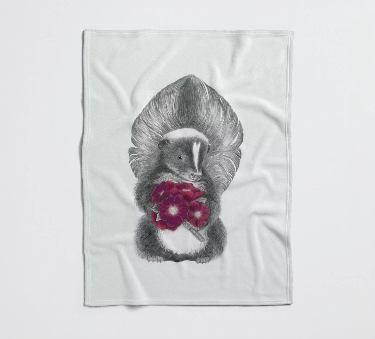 Scruffles Wigglebottom Skunk coperta in pile da Le Canot Rouge