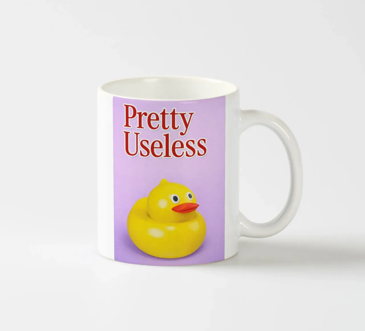 pretty useless ceramic mug by SADELA