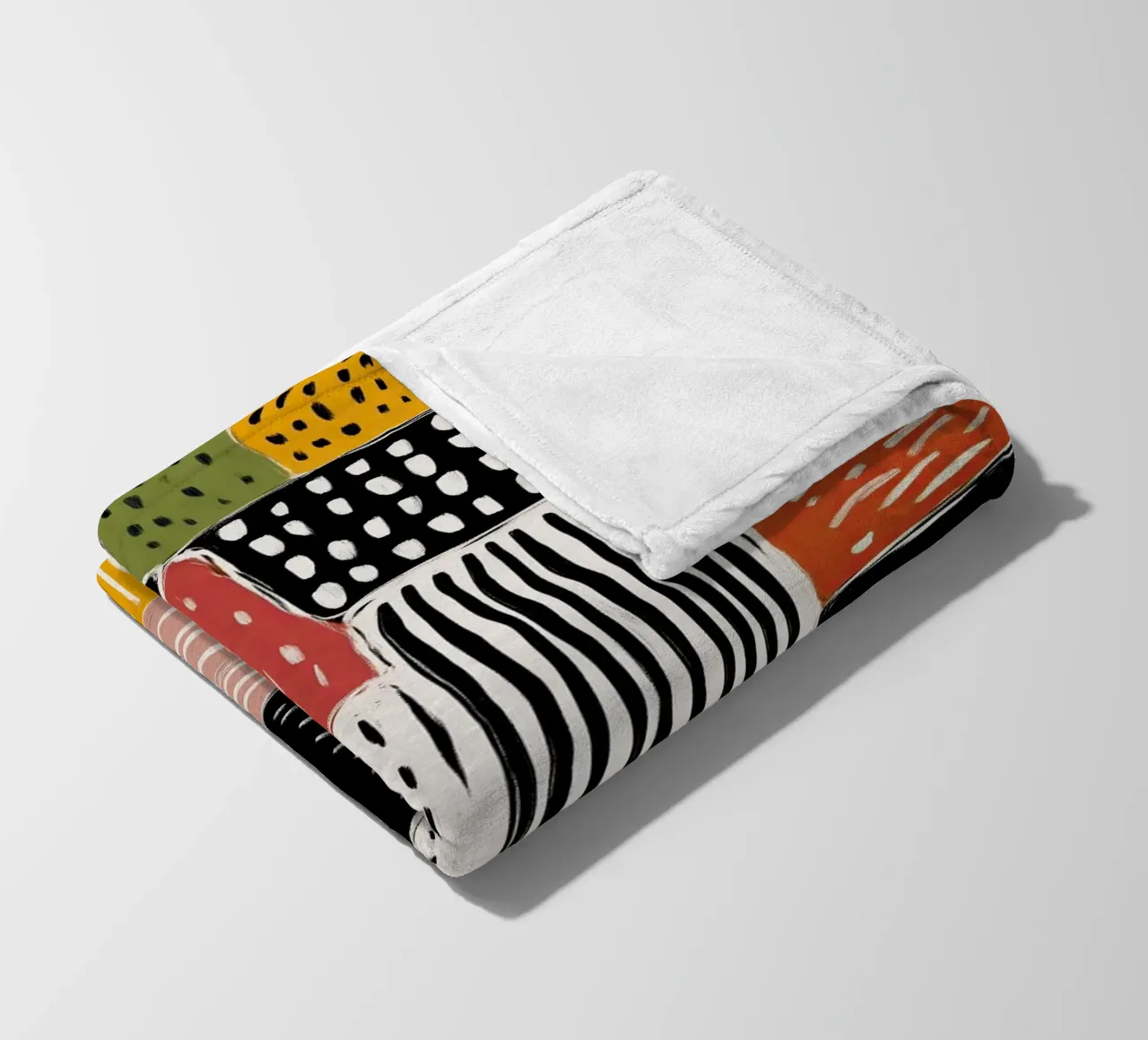 Playful Patchwork Fleecedecke von Sienna Atelier