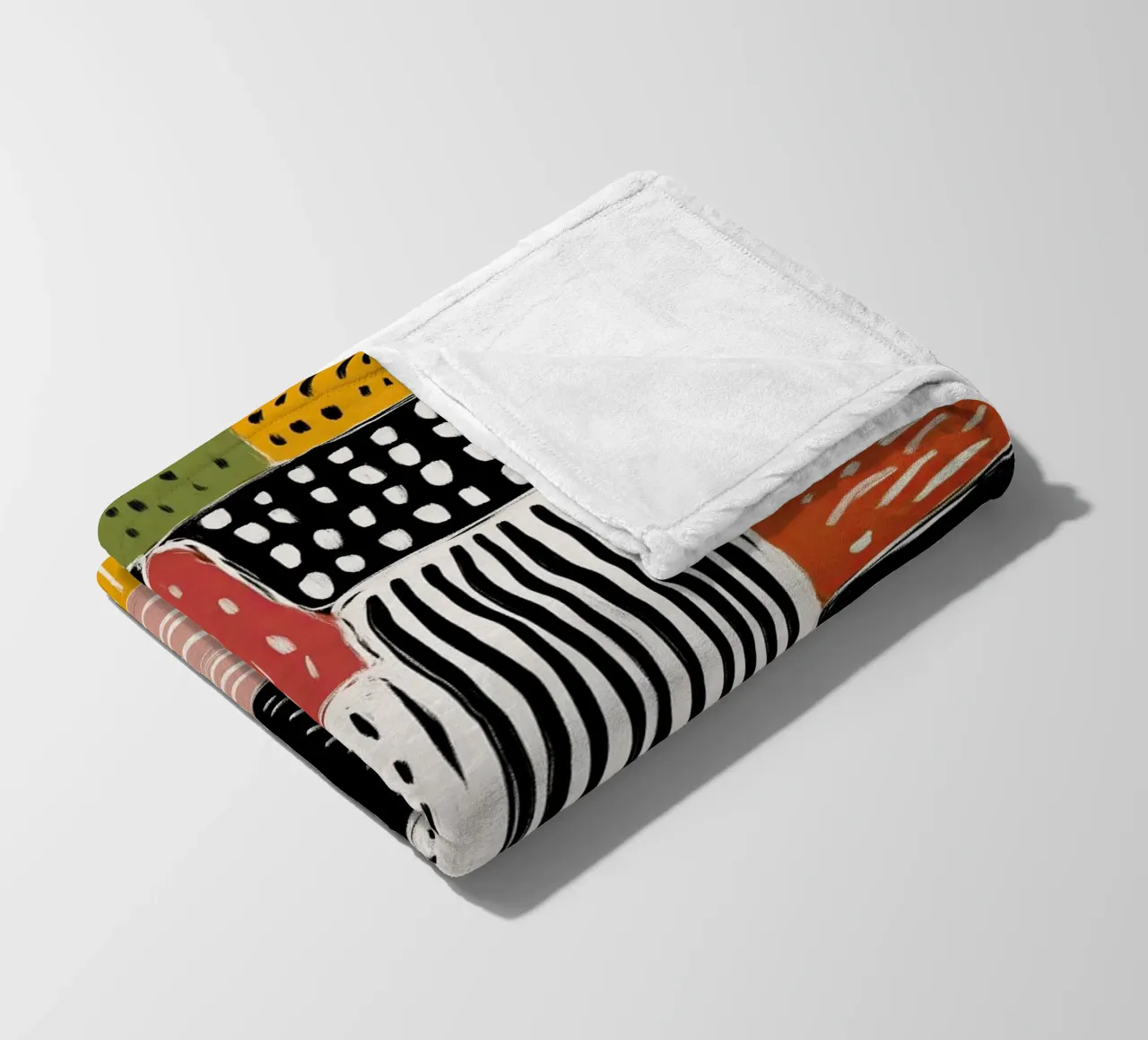 Playful Patchwork Fleecedecke von Sienna Atelier