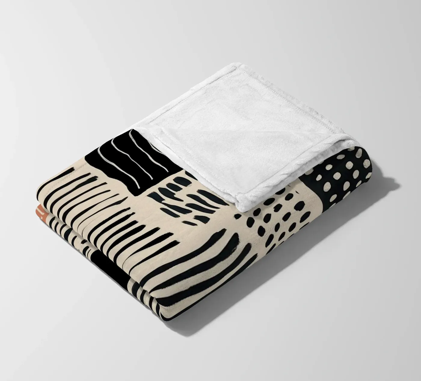 Ink Patchwork fleece blanket by Sienna Atelier