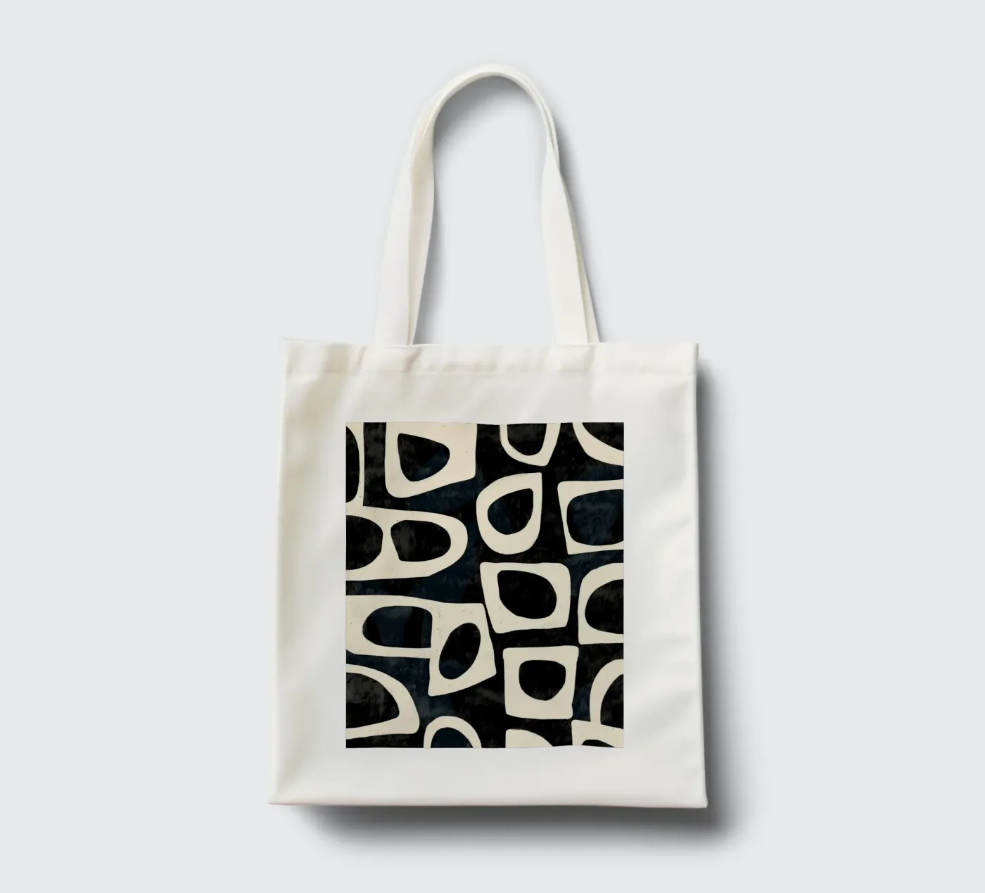Shadowed Forms tote bag by Nadjaa