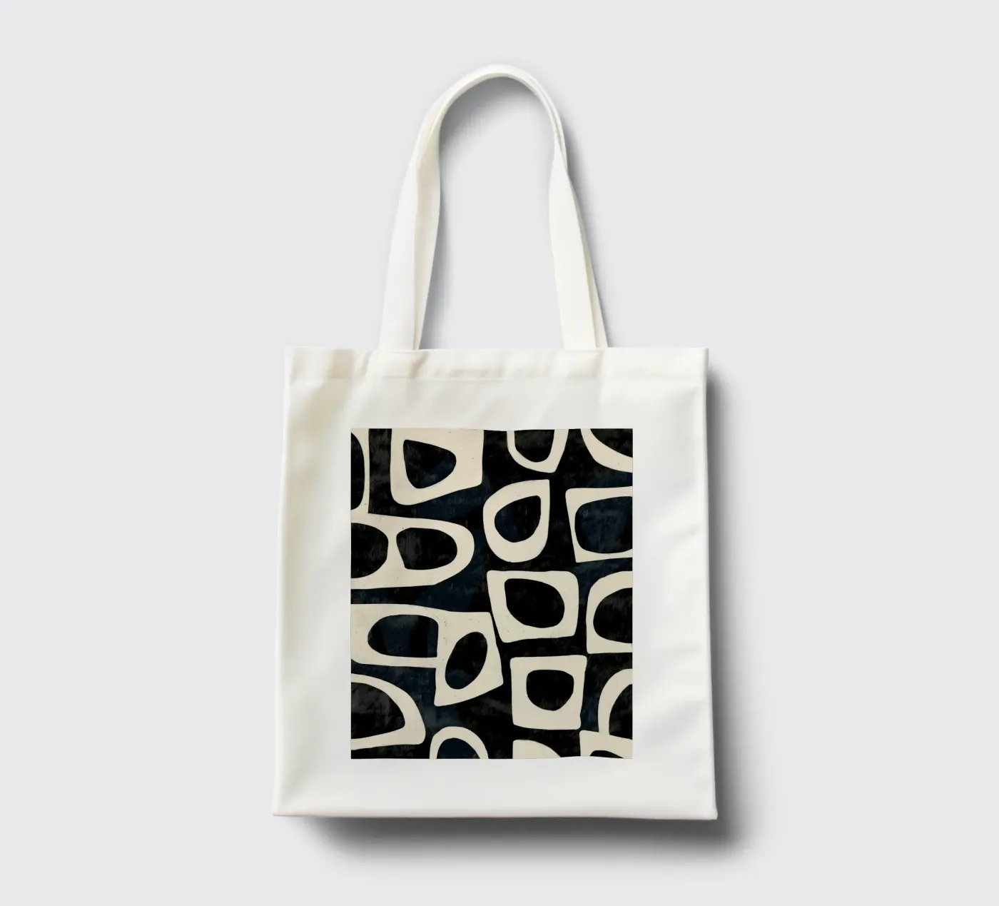 Shadowed Forms tote bag by Nadjaa