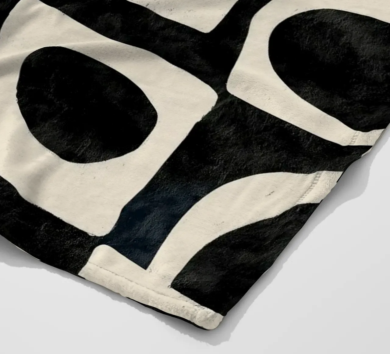 Shadowed Forms fleece blanket by Nadjaa