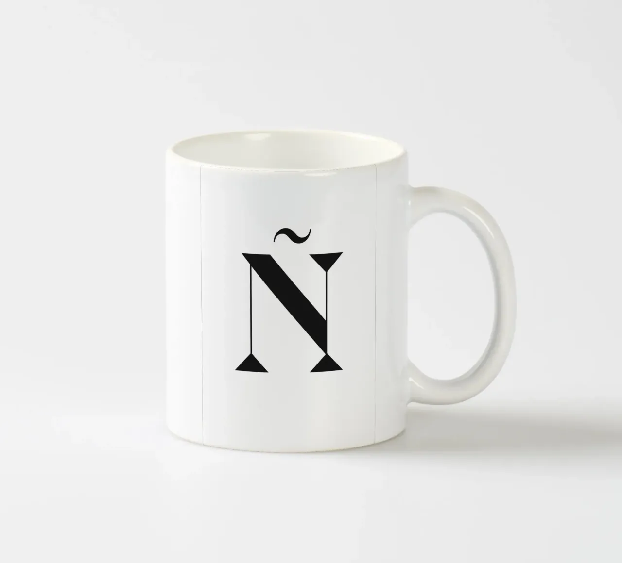 Ñ ceramic mug by n.4
