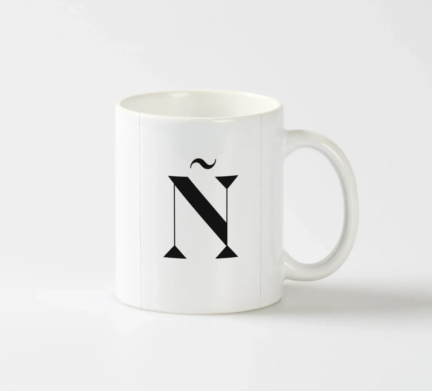 Ñ ceramic mug by n.4