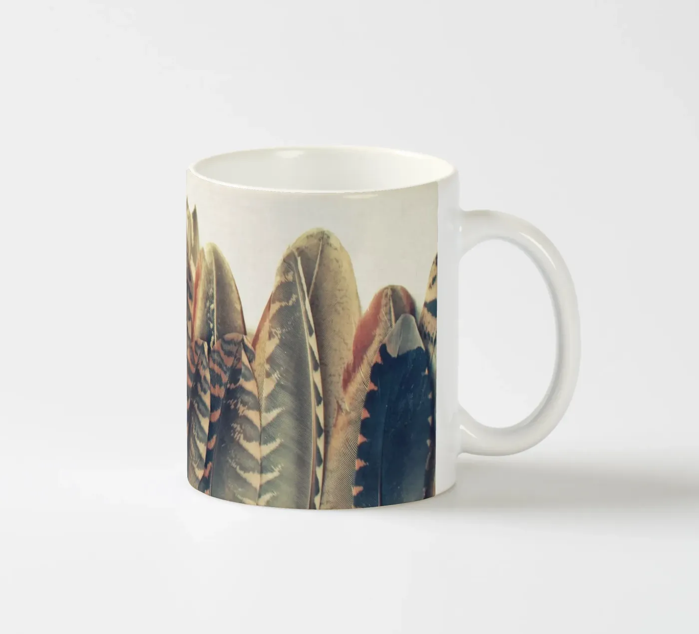 Feather Dip ceramic mug by Cassia Beck Photography
