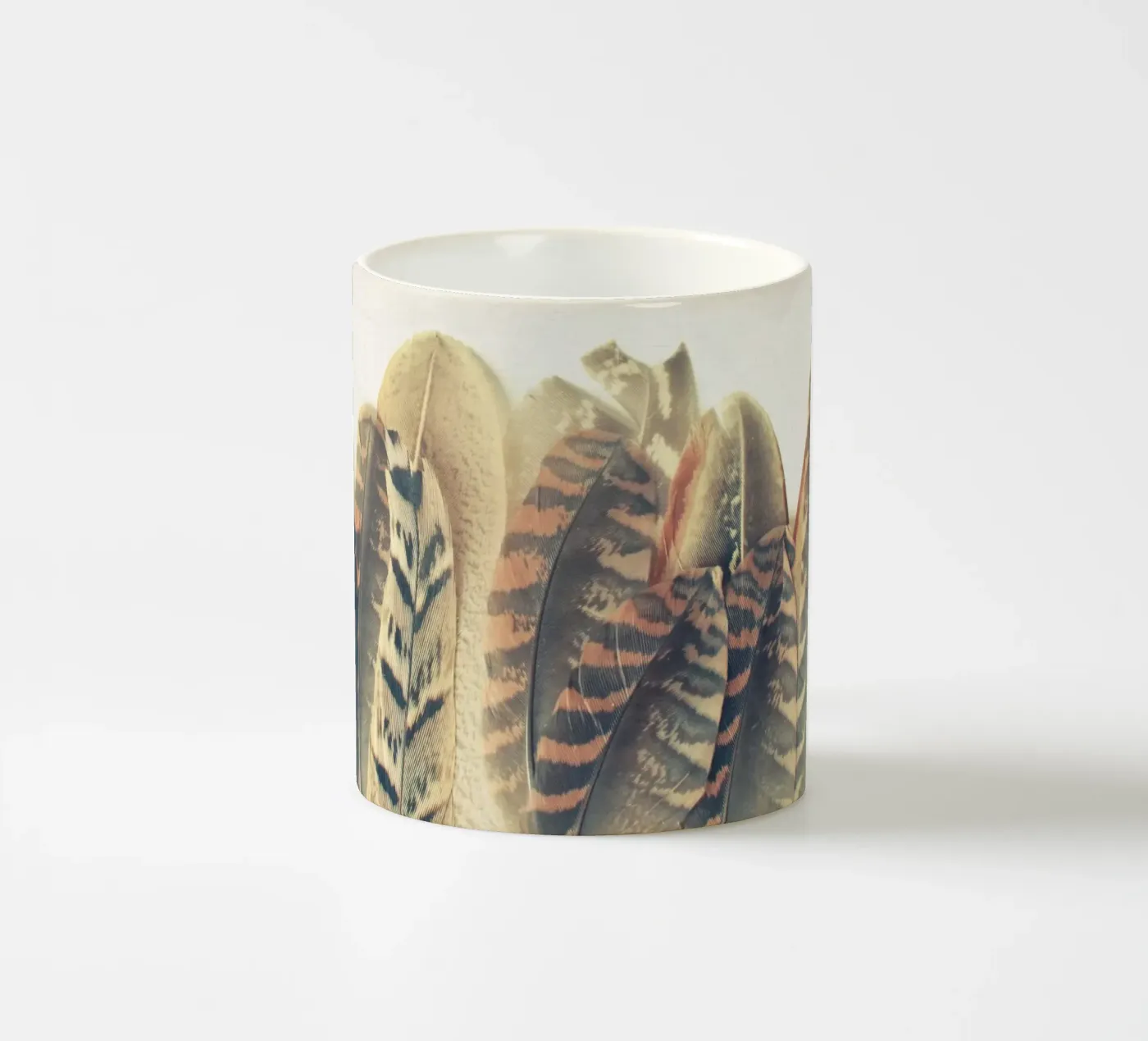 Feather Dip ceramic mug by Cassia Beck Photography