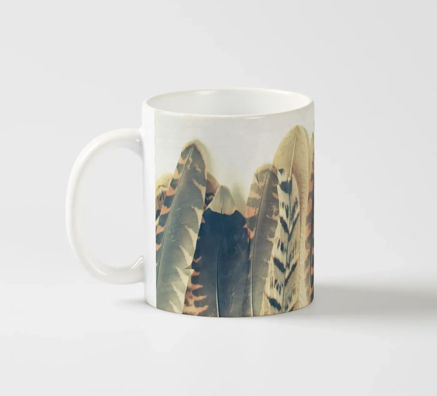 Feather Dip ceramic mug by Cassia Beck Photography