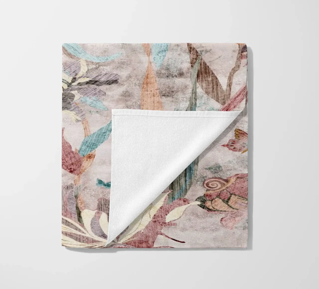 puzzle in fiore telo mare da Giulio Iurissevich