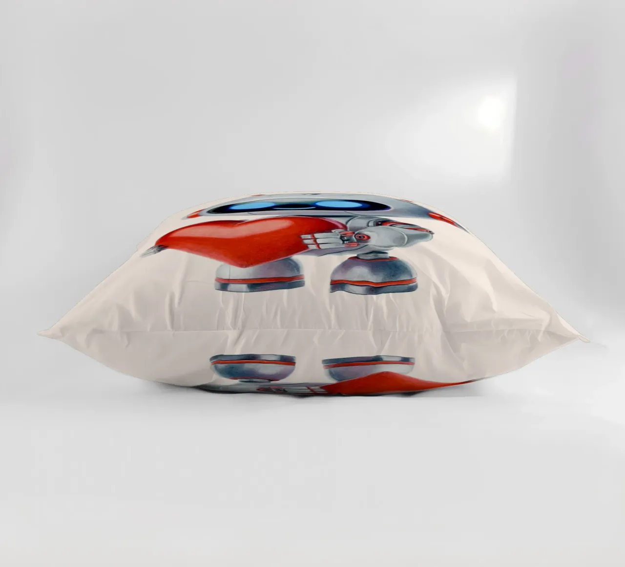 Robot con un cuore cuscino da Graphit und Farbe