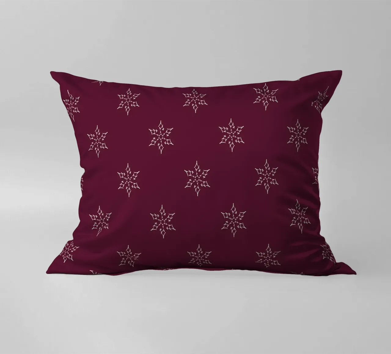Minimal Festive Star | Maroon decorative cushion by sabidussi