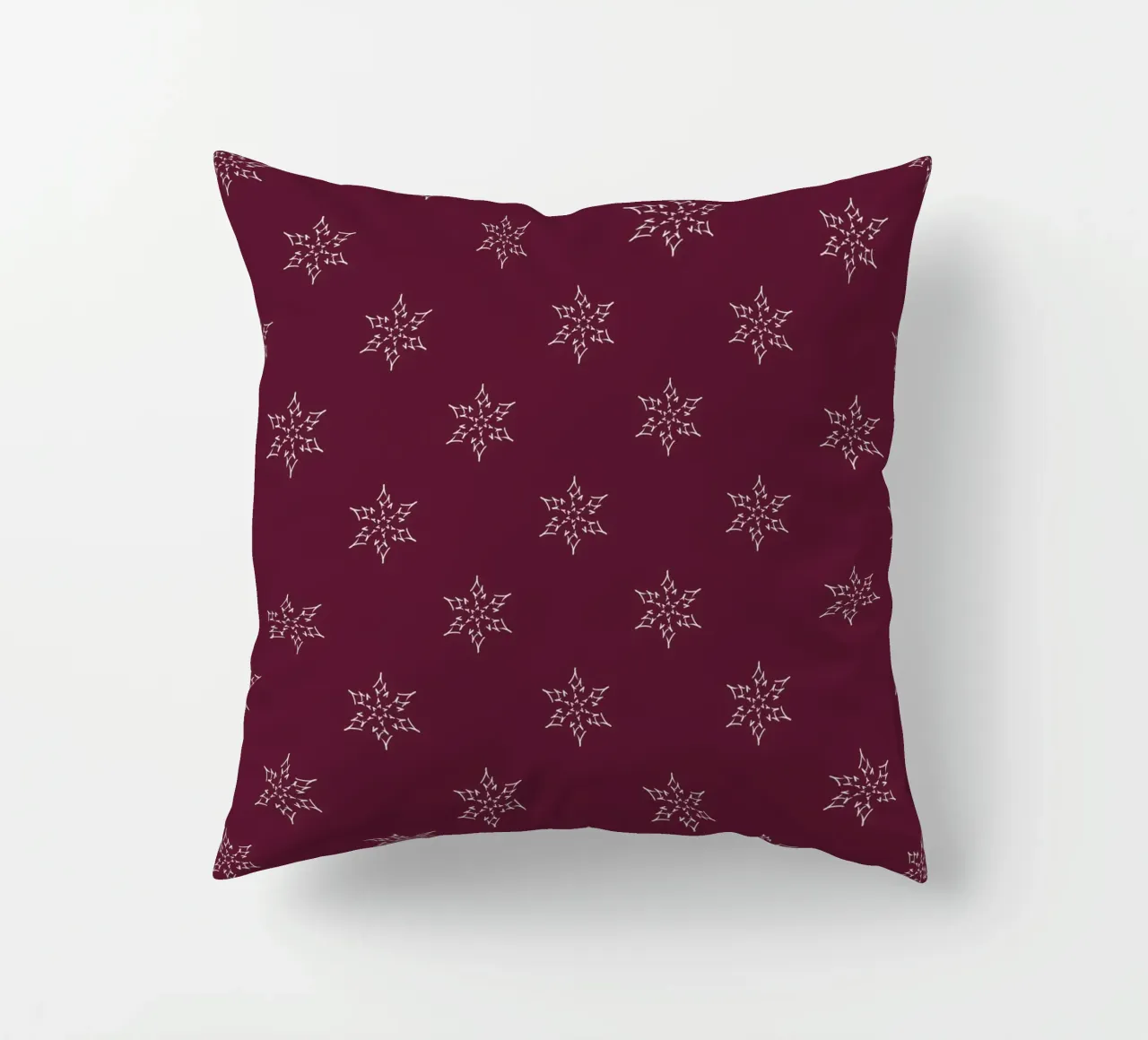 Minimal Festive Star | Maroon decorative cushion by sabidussi