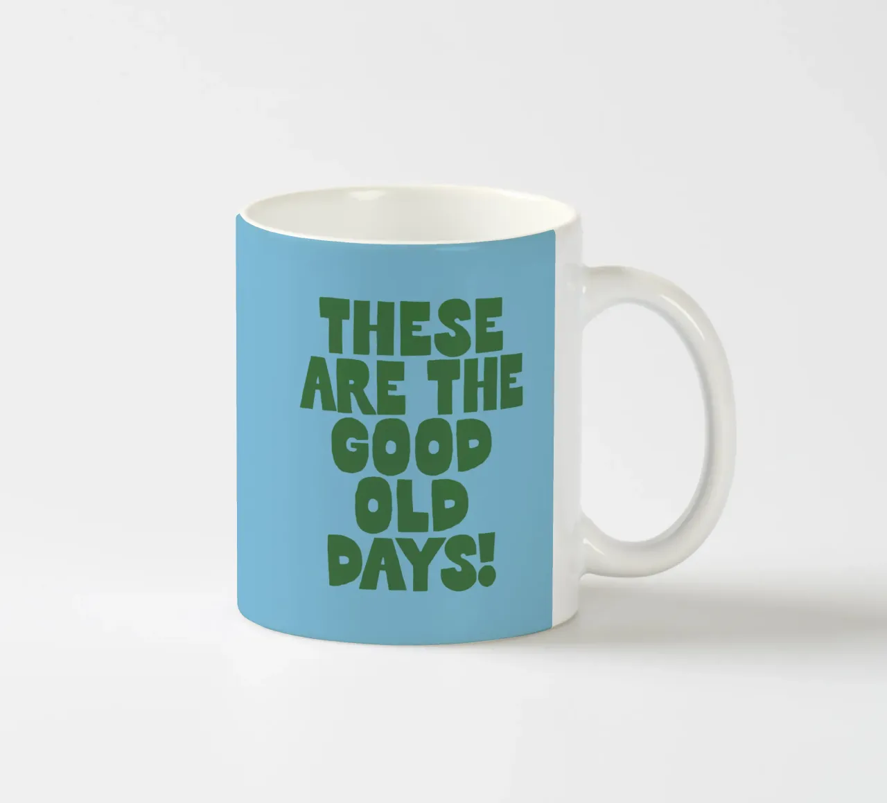 These Are the Good Old Days Typografie Design in blu tazza in ceramica da THE MOTIVATED TYPE