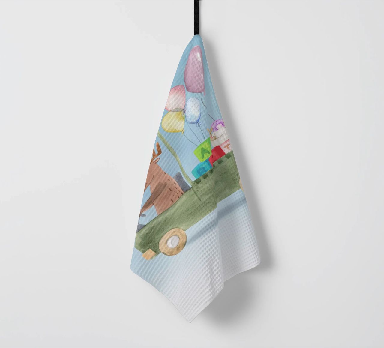 Un renne dans une aventure de jouets torchon de Doodle Dreams Art