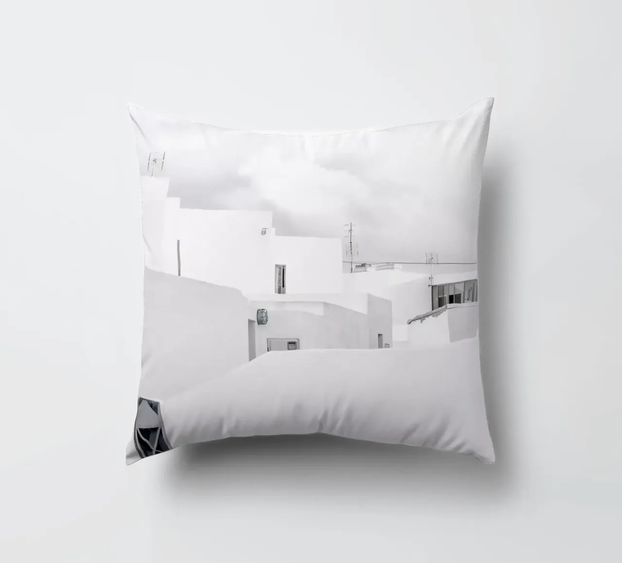 White Village decorative cushion by Amy & Kurt